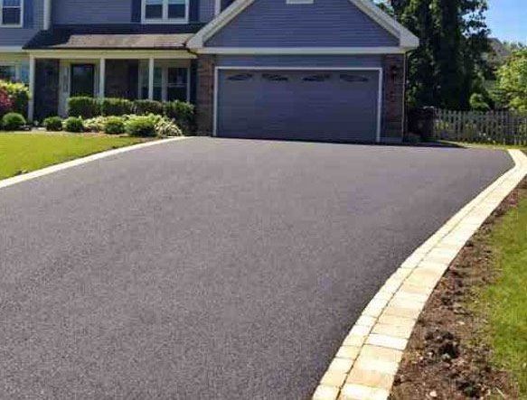 Image of a driveway leading up to a house